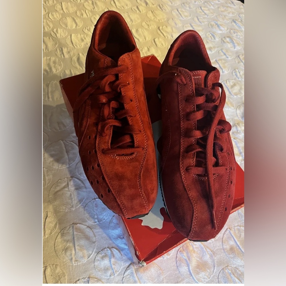 Puma mens Sprint Size 12 red. Condition is New with box.